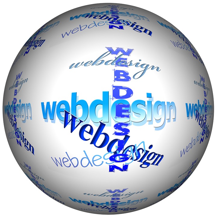 Белы шар, на котором разными шрифтами написано слово Webdesign